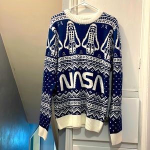 This is a nasa Christmas sweater!! Supper comfy and soft!!! *great present*